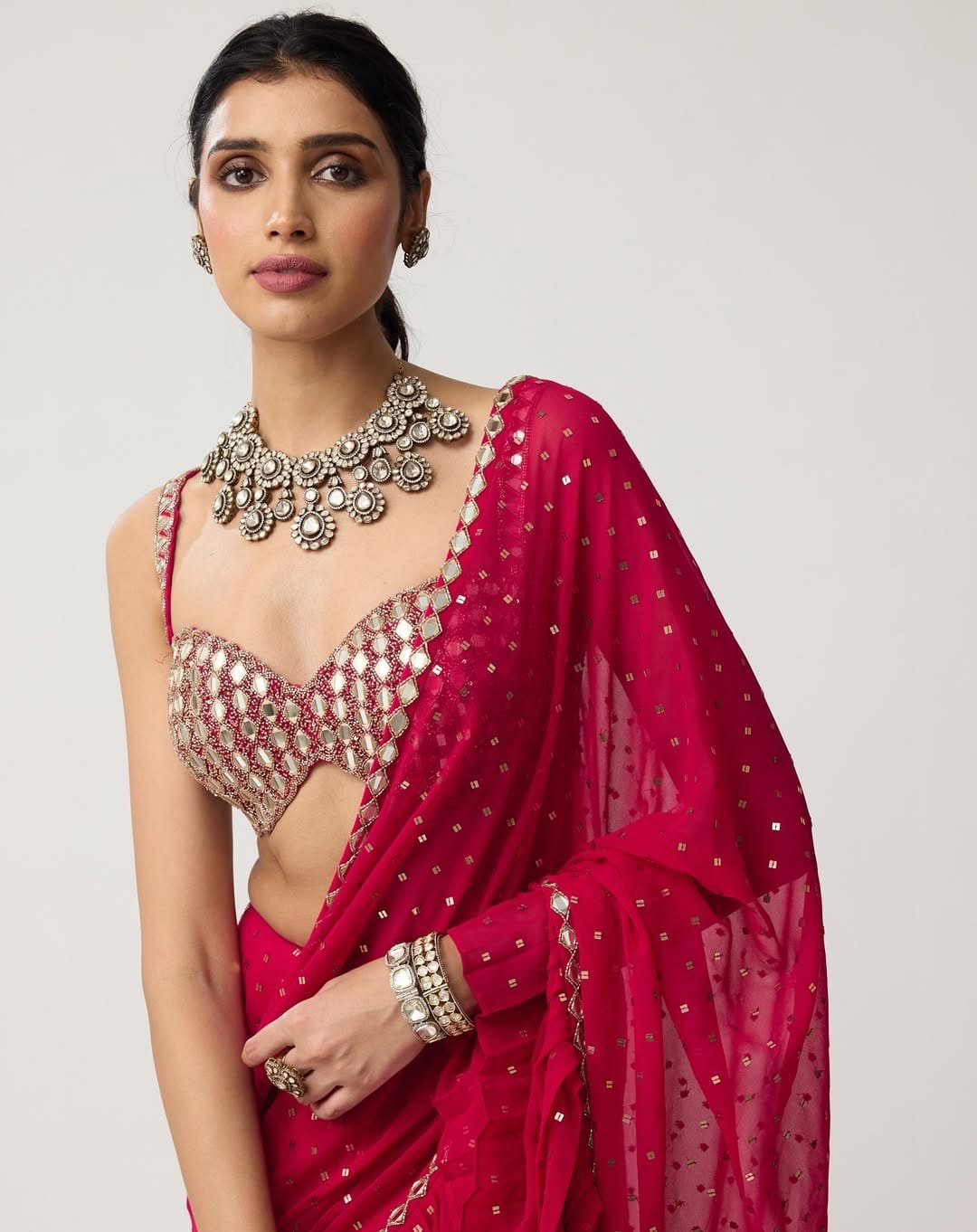 Faux Georgette Sequins Crush Pleated Saree with Mirror Work Blouse