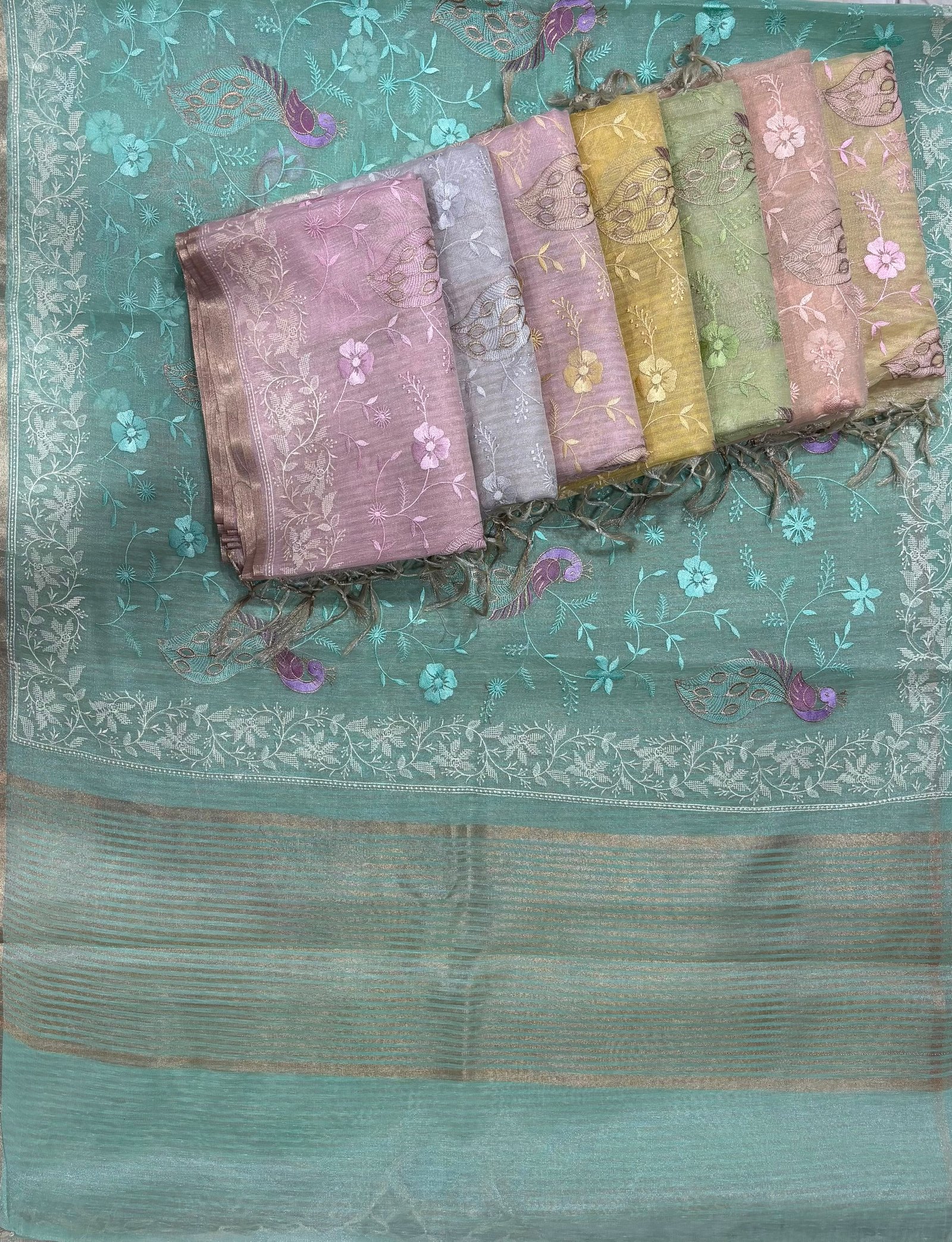 Designer Linen Tissue Saree with Thread Work Embroidery Peacock Pattern and Golden Zari Weaving Border Code !! B.H.C.